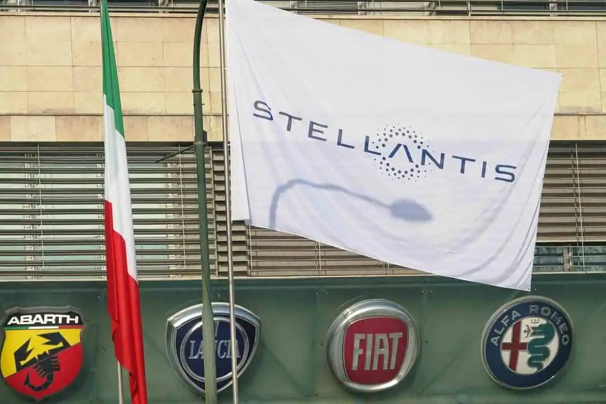 The Stellantis logo and new flags are installed at Mirafiori. Stellantis was created from the merger of the Fiat Chrysler Automobiles and PSA industrial groups