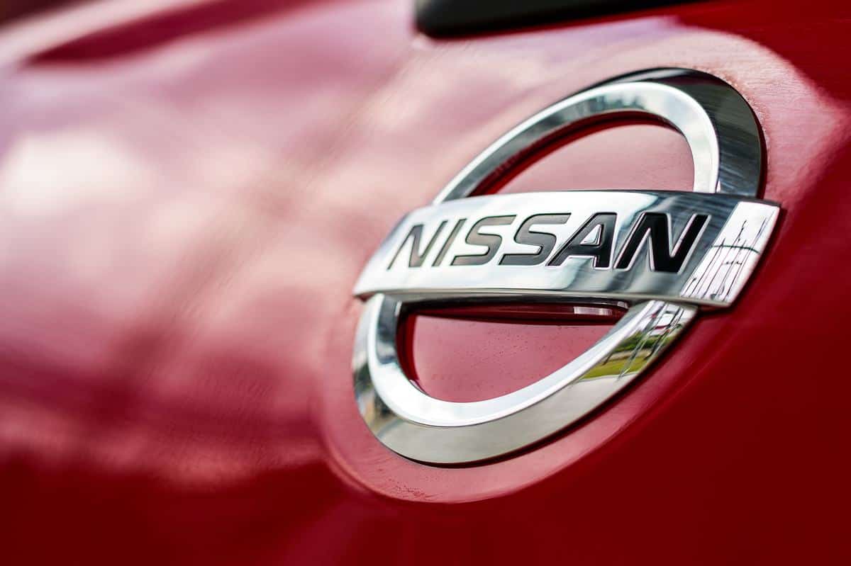 closeup logo nissan car with soft-focus and over light in the background