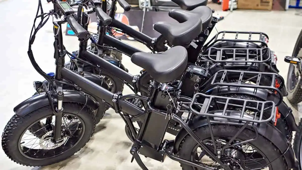 Black electric bicycles in a shop