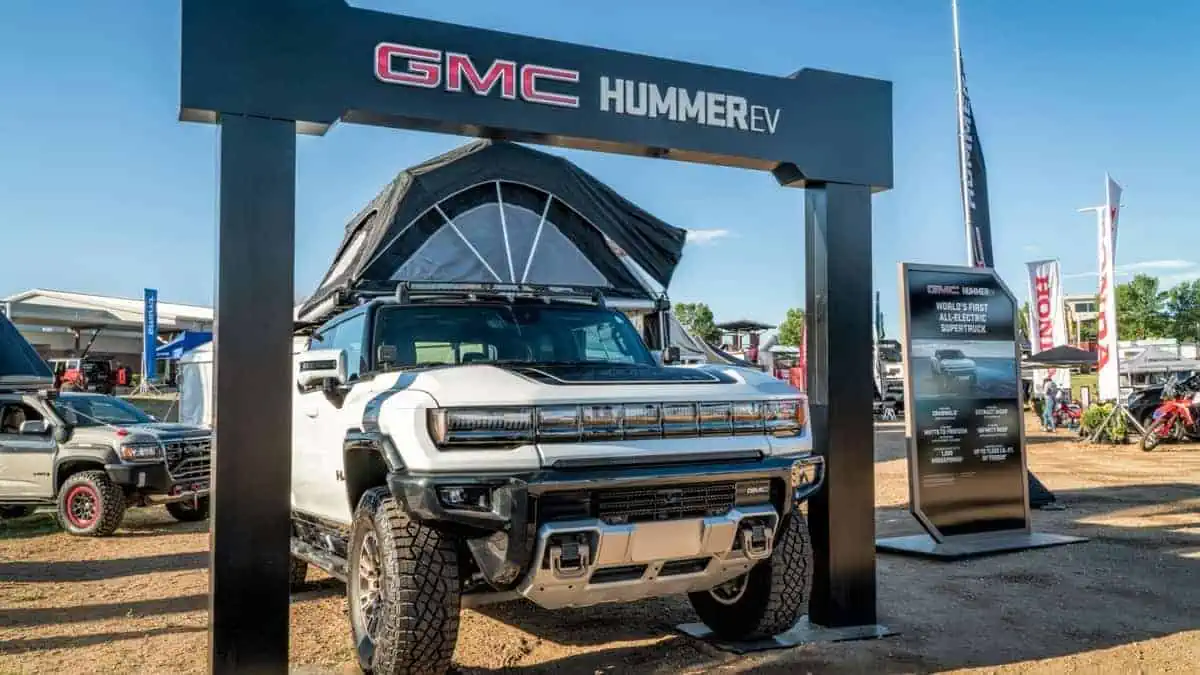 Loveland, CO, USA - August 28, 2022 GMC HUMMER EV pickup, world_s first all-electric supertruck with a roof tent.
