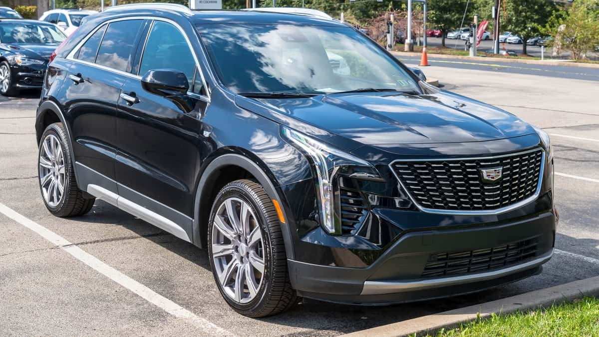 Monroeville, Pennsylvania, USA September 25, 2022 A new black Cadilac SUV for sale at a dealership on a sunny fall day