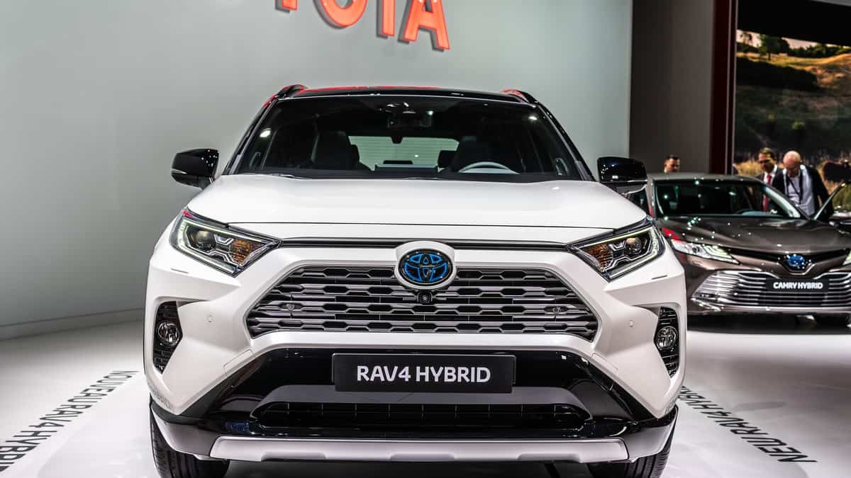 Paris, France, October 02, 2018 metallic white Toyota RAV4 Hybrid at Mondial Paris Motor Show, produced by Japanese automaker Toyota