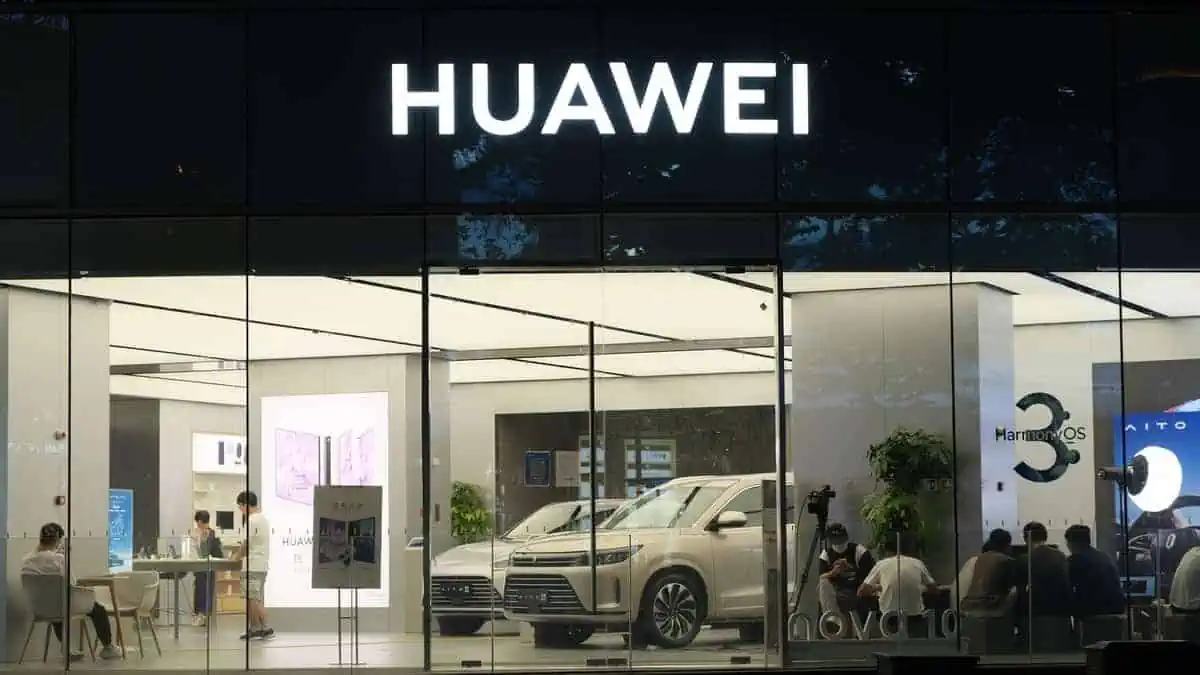 Shanghai,China-August 14th 2022 Huawei retail store logo and electric car. A Chinese electronic company