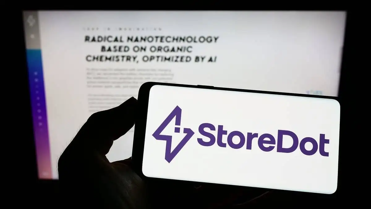 Stuttgart, Germany - 09-09-2022 Person holding mobile phone with logo of Israeli battery company StoreDot Ltd. on screen in front of business web page. Focus on phone display. Unmodified photo